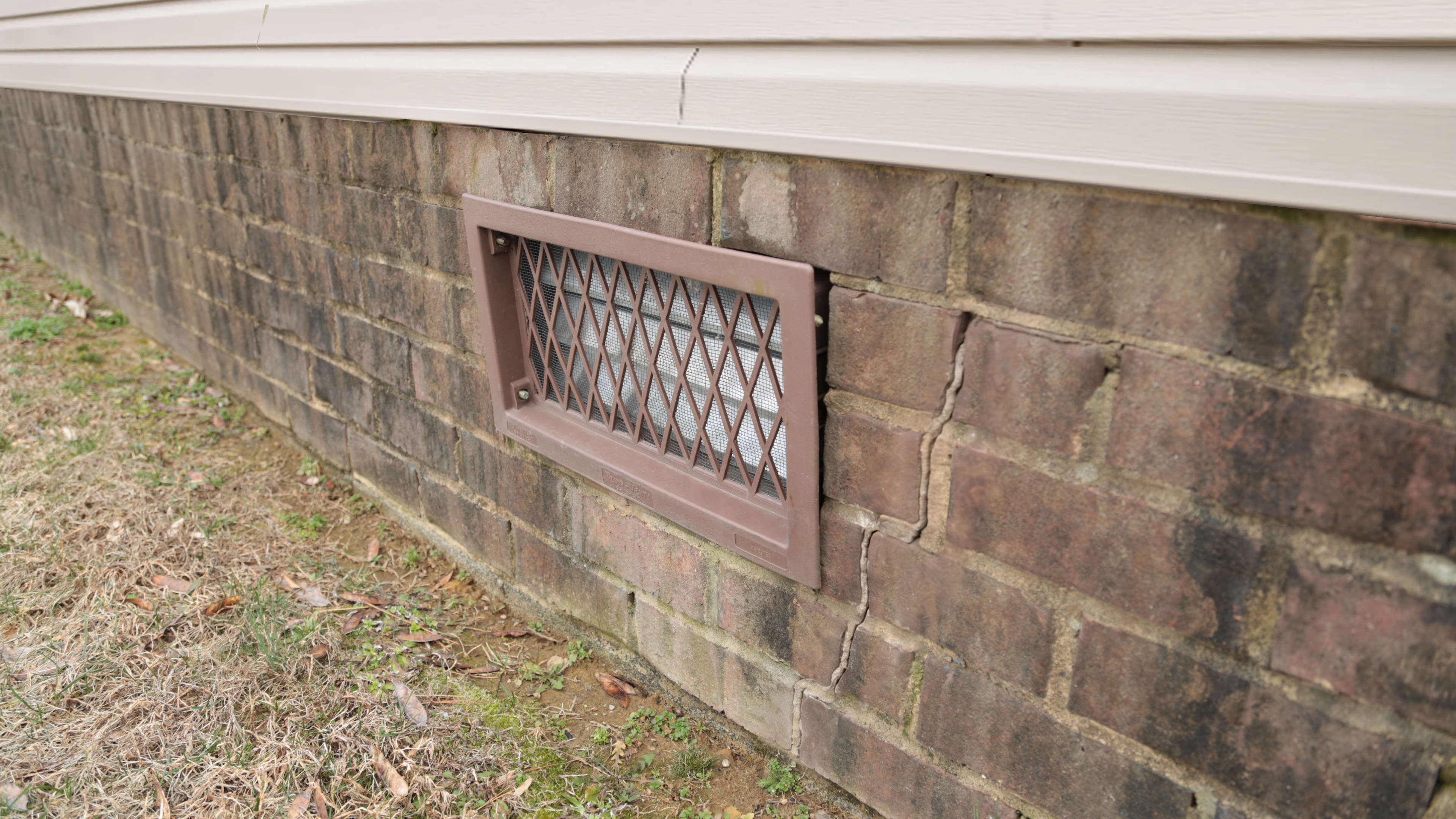 Cracks around a crawl space door