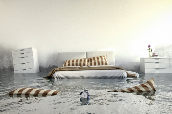 AI generated image of bed dresser pillows clock floating in water