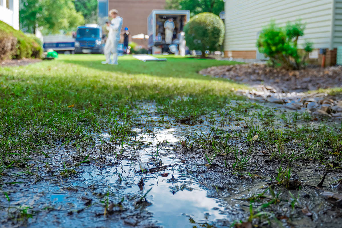 Flooded yard near house