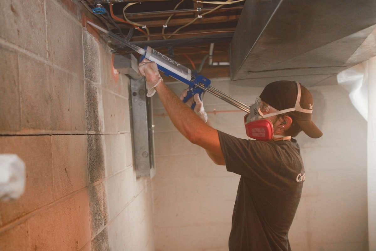 JES CFI sealing wall cracks on concrete basement walls