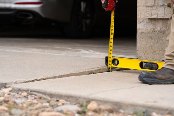 tape measure concrete slab foundation repair in Auburn AL
