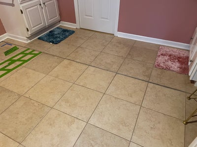 minor cracks and unevenness in tile floor