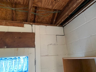 cracking wall and sticking door