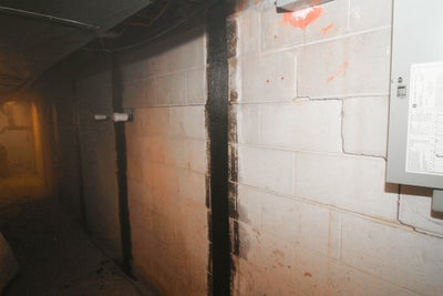 Carbon fiber on a basement wall.