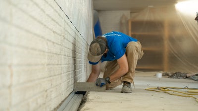 interior drainage being installed