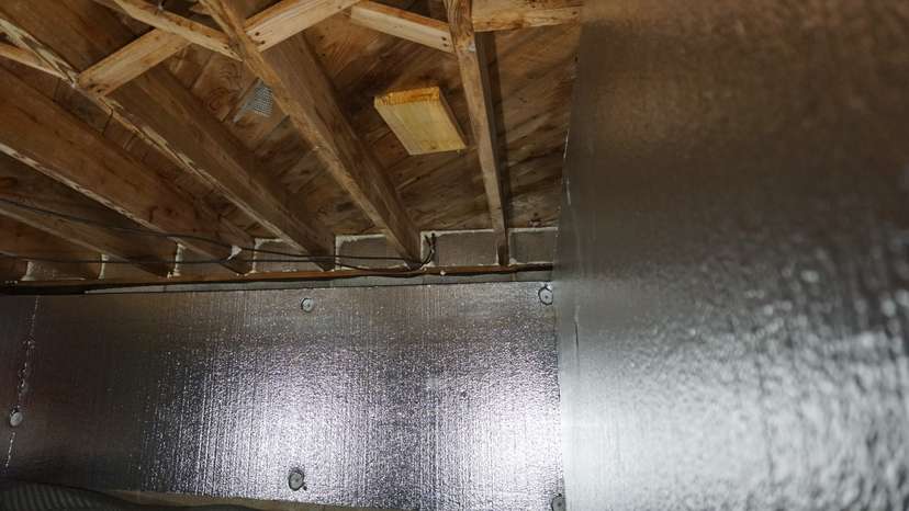 crawl space foam board insulation panel installed on crawl space wall