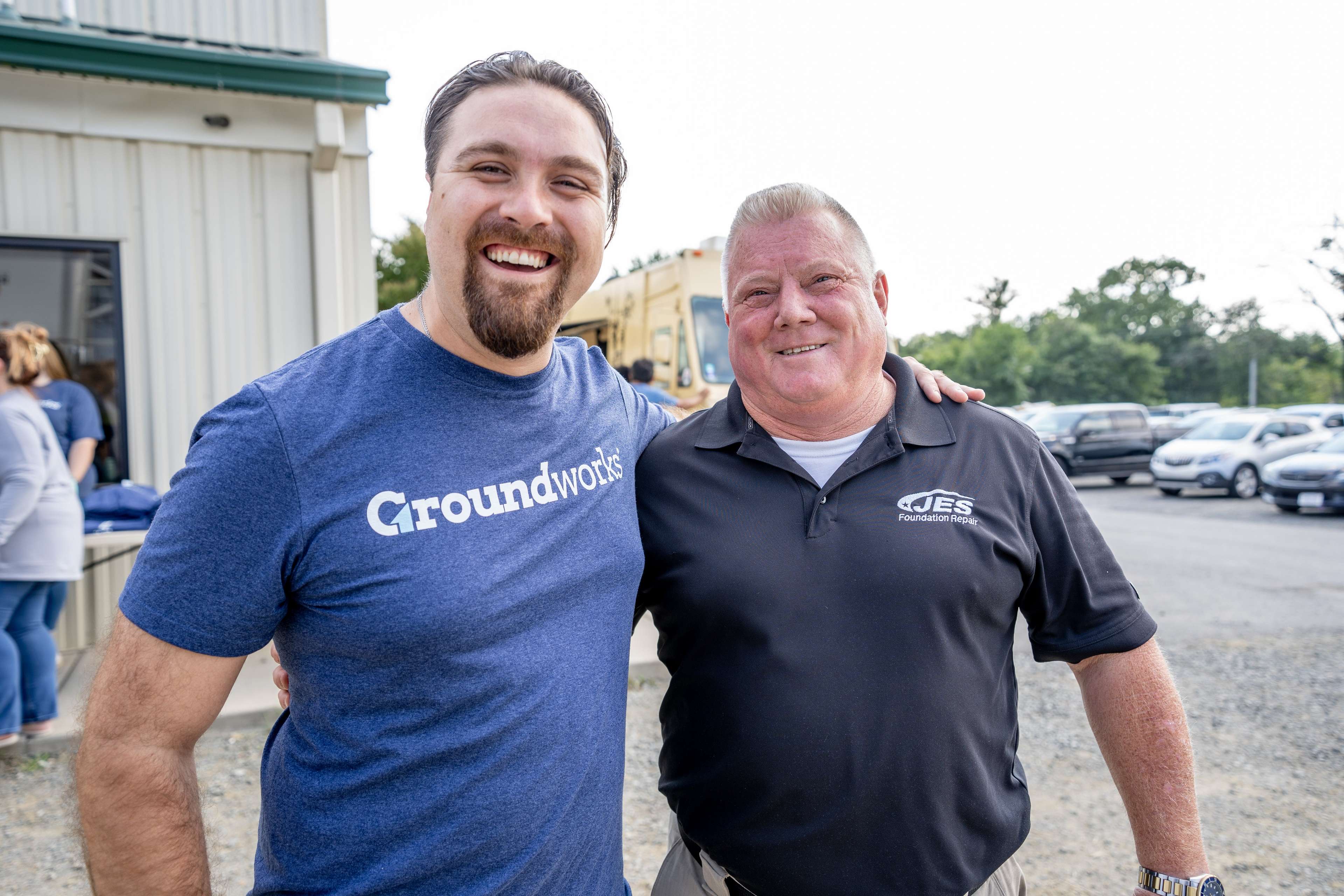 Team members in JES and Groundworks shirts