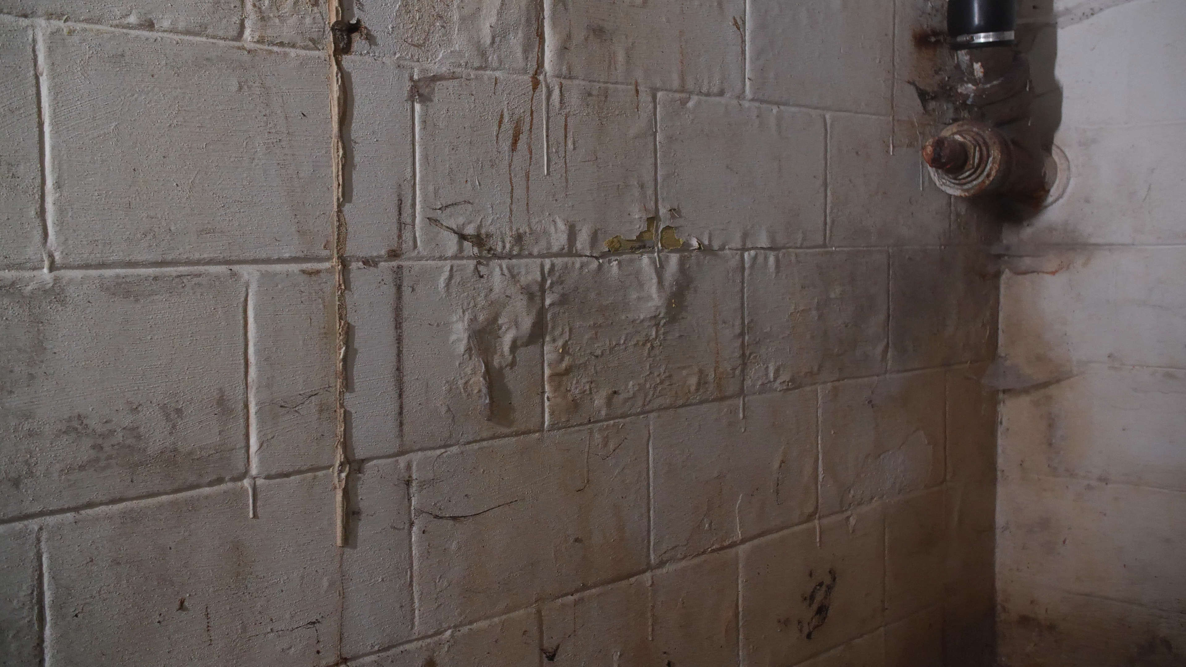 Warped basement wall