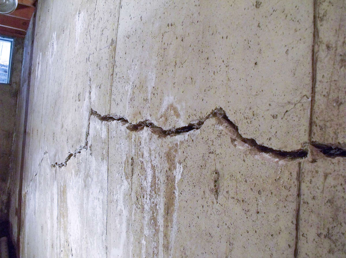 Large crack in a concrete basement wall.