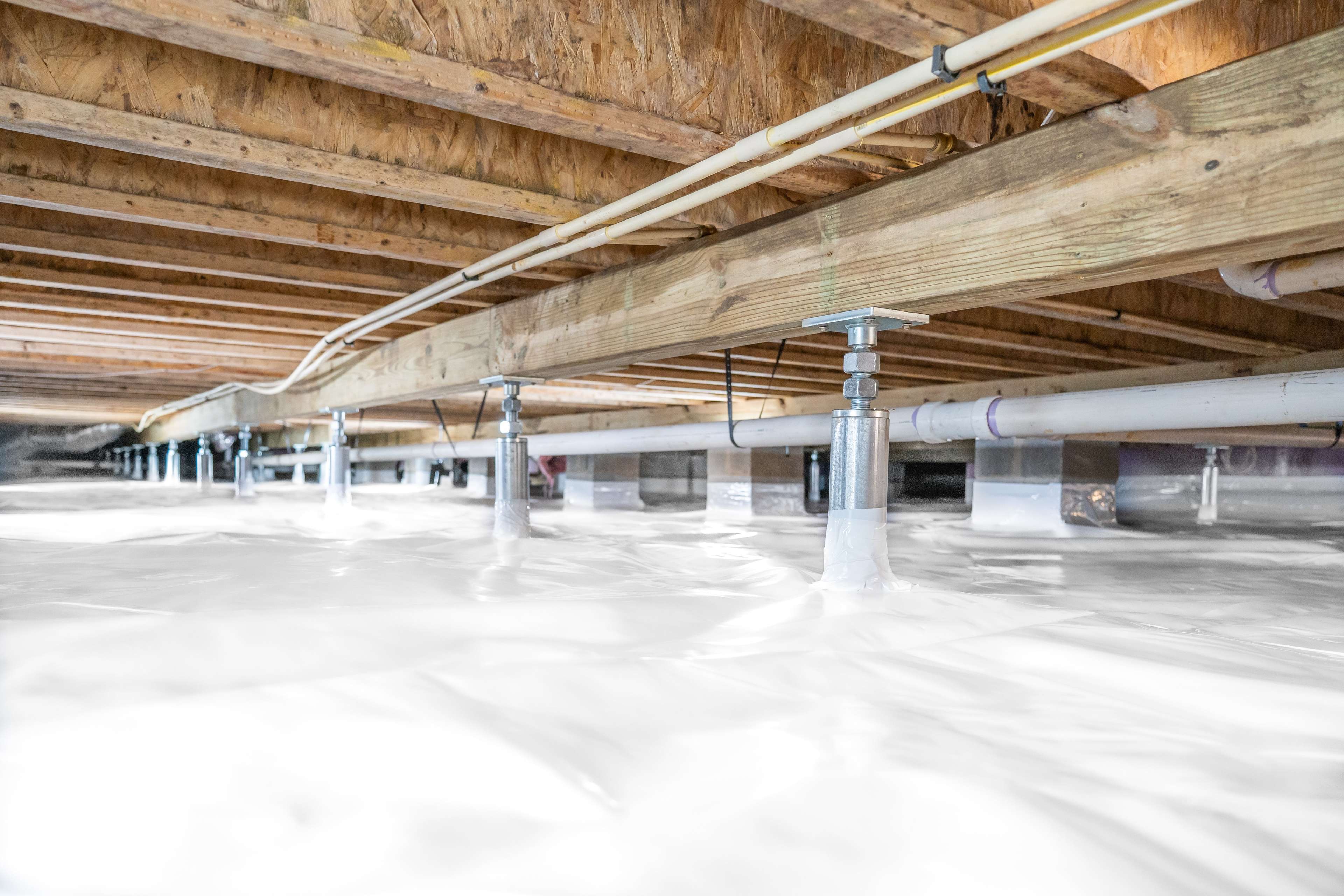 encapsulated crawl space with support jacks installed