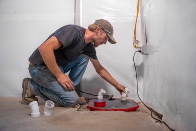 sump pump installation in a basement