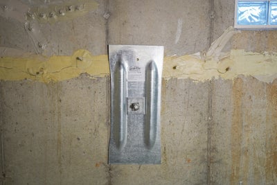 wall anchor on a basement wall