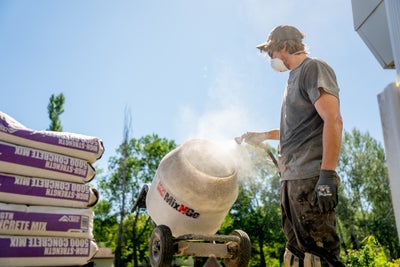 man mixing concrete