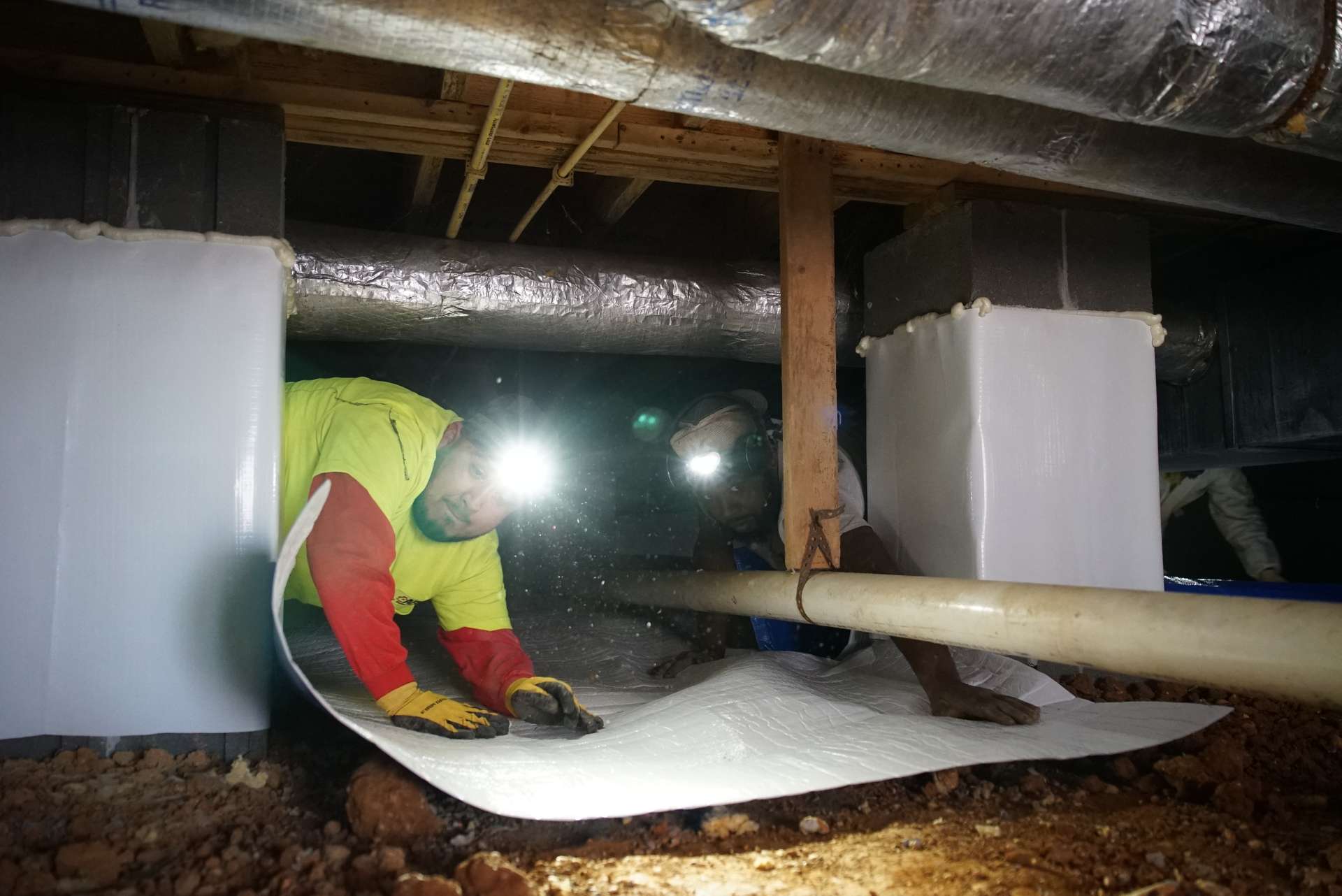 Crawl Space encapsulation with vapor barrier installation