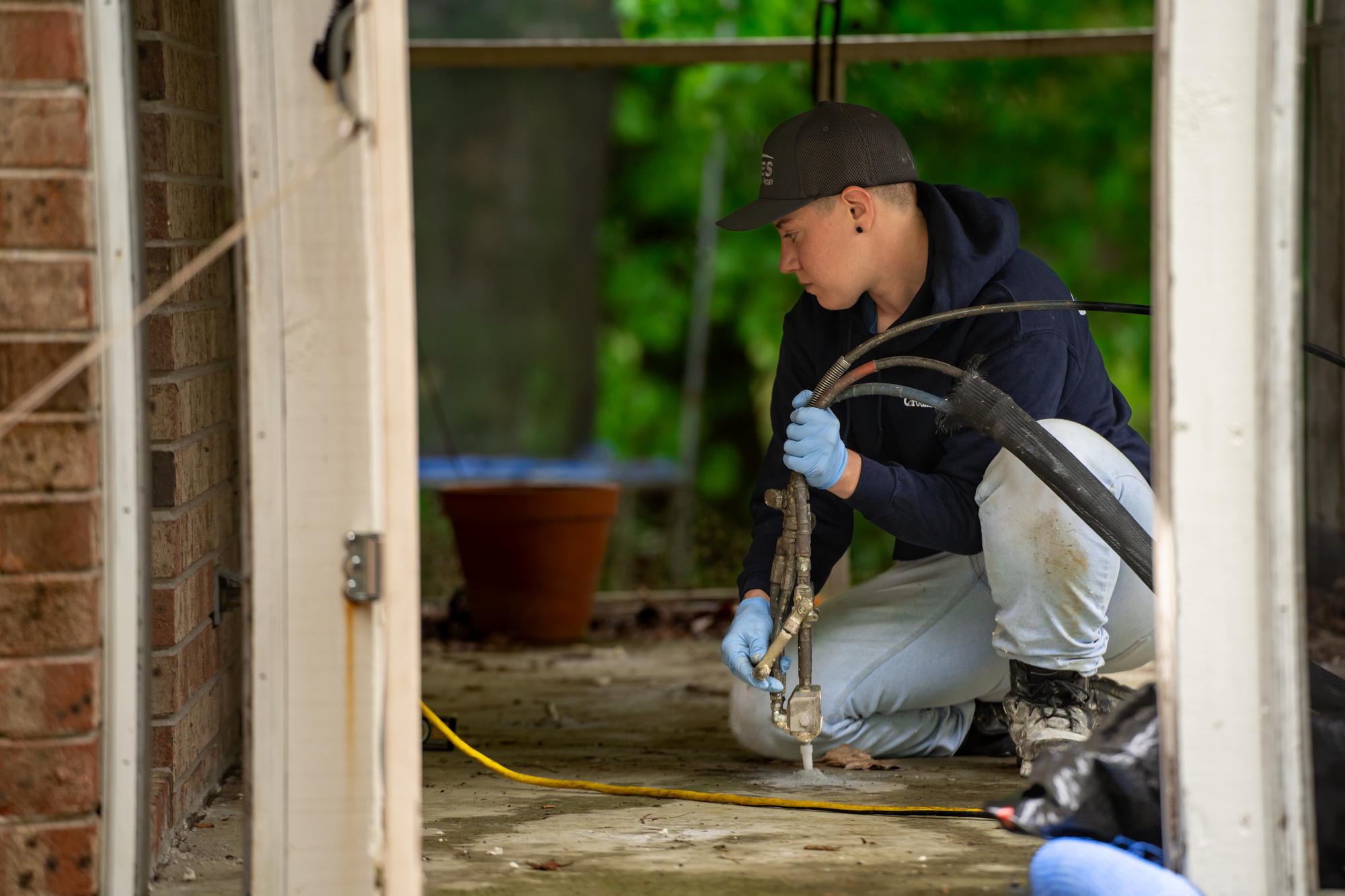 crew installing polyrenewal concrete lifting foam