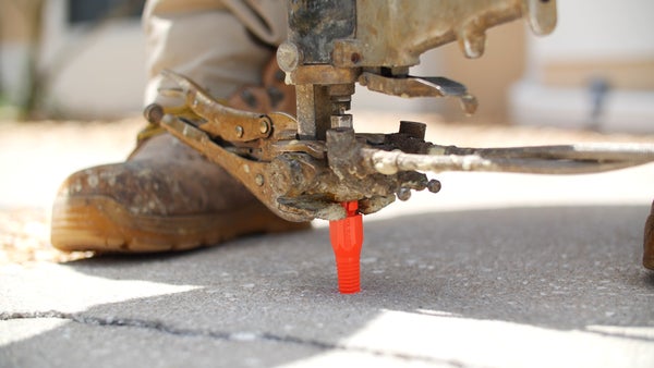 poly foam tool and work boot on slab foundation