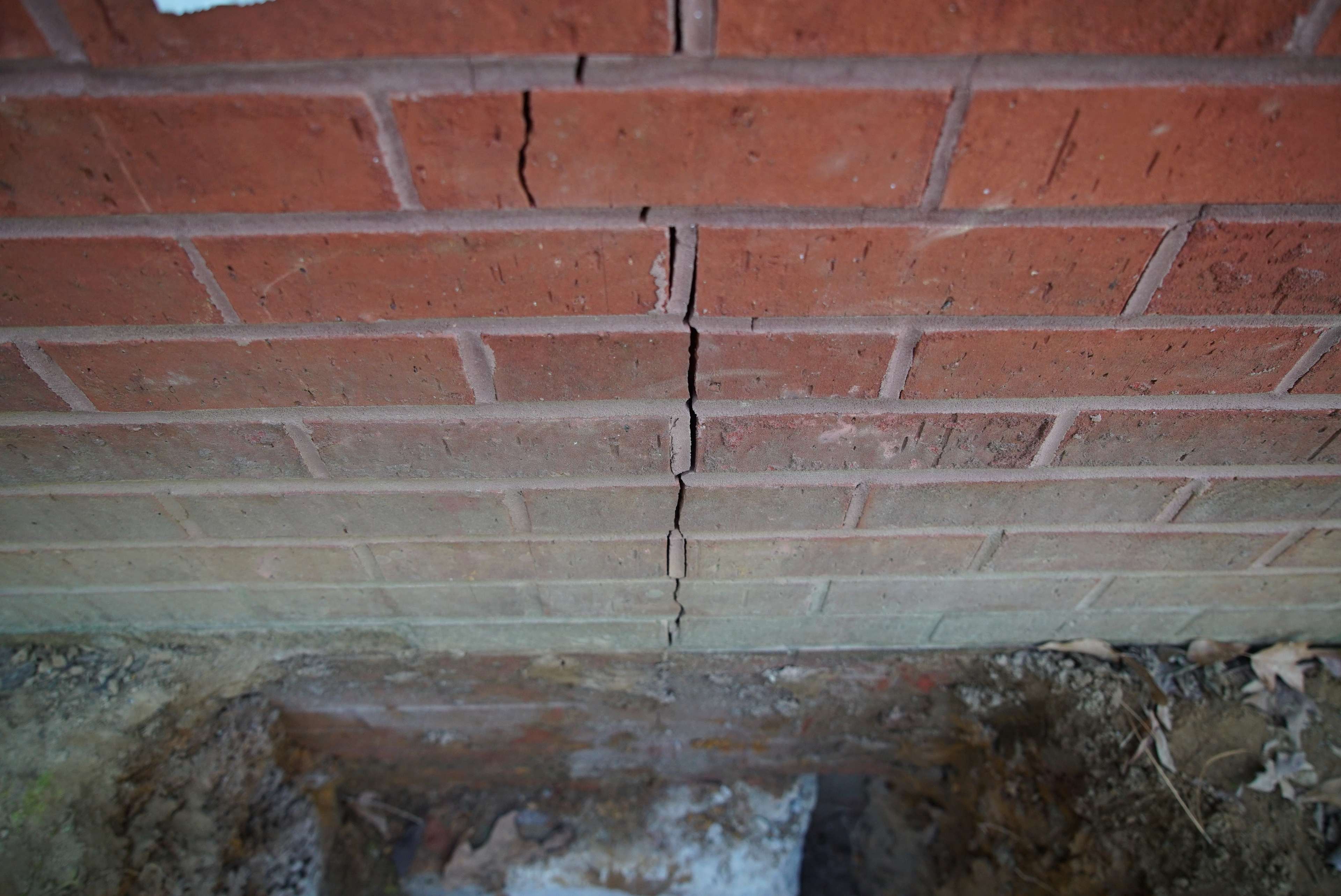 crack on side of brick house