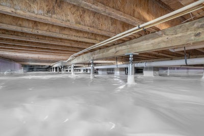 encapsulated crawl space with crawl space support jacks installed