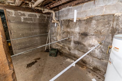 Wall anchor supporting a basement wall.