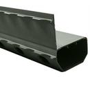 Close-up of a green, hollow rectangular metal tube with perforated sides and a top extending edge.