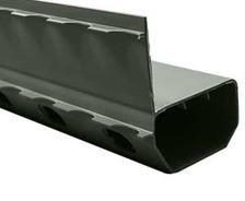 Close-up of a green, hollow rectangular metal tube with perforated sides and a top extending edge.