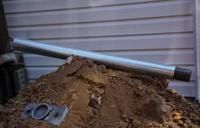 Close up Push pier sitting on soil mount outside.