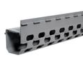 Gray metal channel with perforated holes and a top edge flange.
