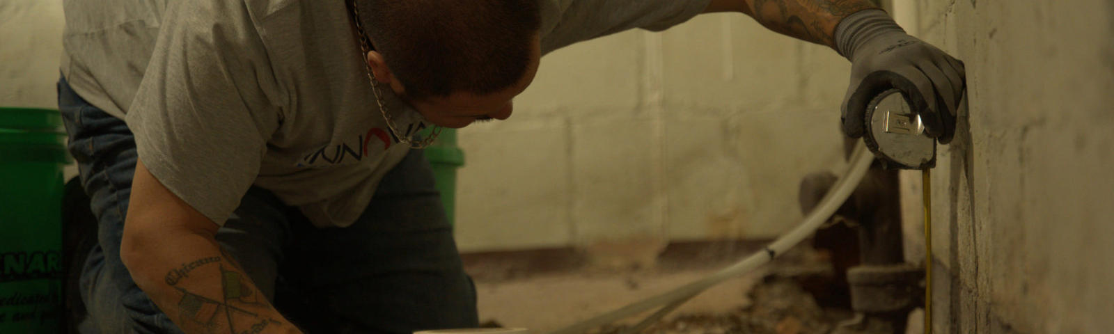 IBA Crew installing Basement gutter guard.