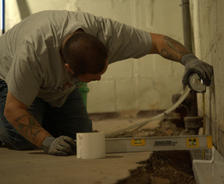 IBA Crew installing Basement gutter guard.