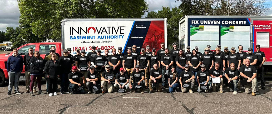 Innovative Basement Authority crew and trucks.