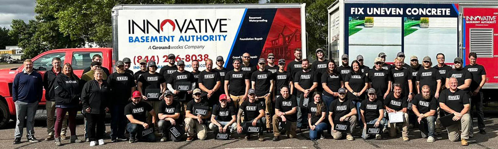 Innovative Basement Authority crew and trucks.