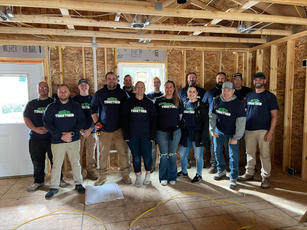 IBA and Habitat for Humanity volunteers; project's interior.