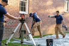 Groundworks experts assessing a foundation.