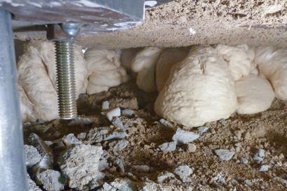 Close-up of slab pier and poly injection.