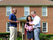 CFI discussion with customers in the front yard.