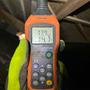 Moisture meter test in crawlspace.