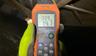 Moisture meter test in crawlspace.