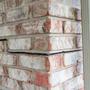 stairstep crack in brick on corner of home