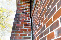 Brick chimney separating from the exterior foundation wall.