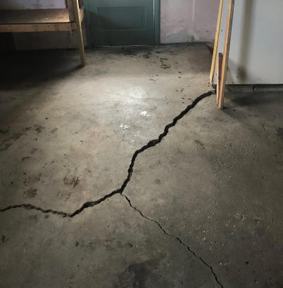 cracking basement floor