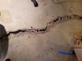 Extreme gaping crack on garage floor