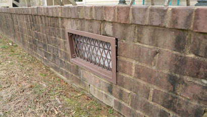 Bad Crawlspace Vent in brick