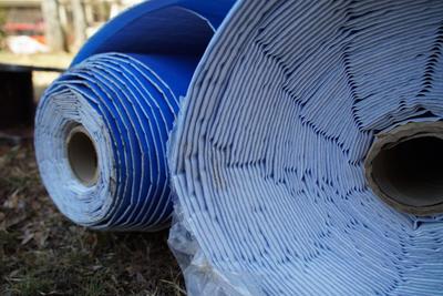 Close up of large rolls of vapor barrier