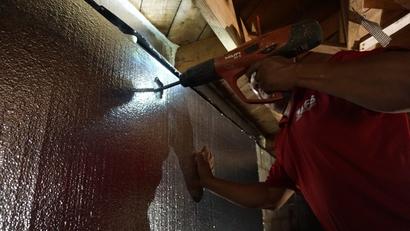 AFS Repair crew installing thermal insulation