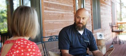 Groundworks CFI presenting to customer on front porch