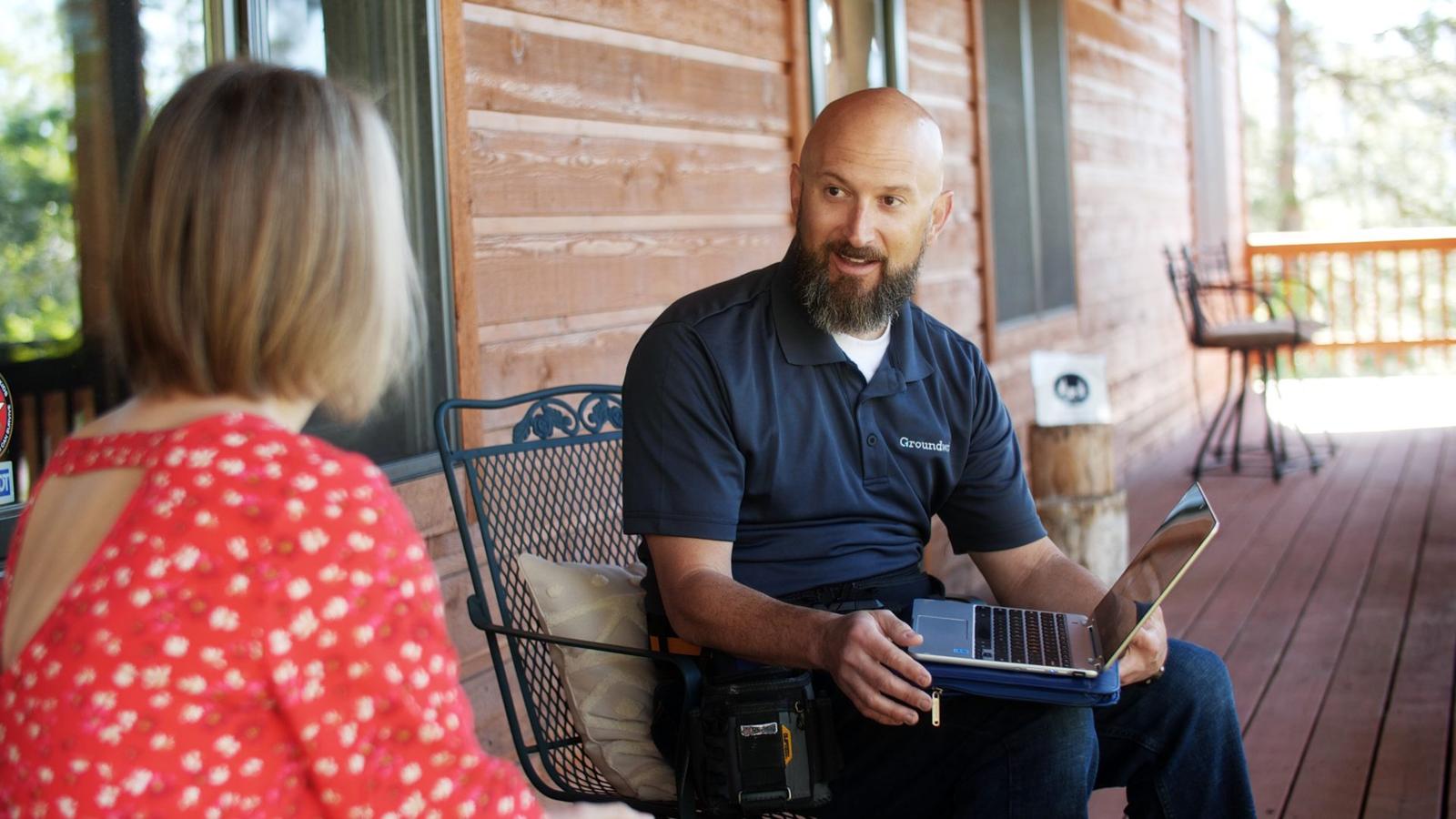 Groundworks CFI presenting to customer on front porch