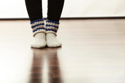 socks on warm crawl space floor