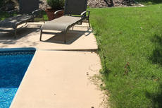 cracked and uneven pool deck