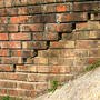 cracking brick wall exterior