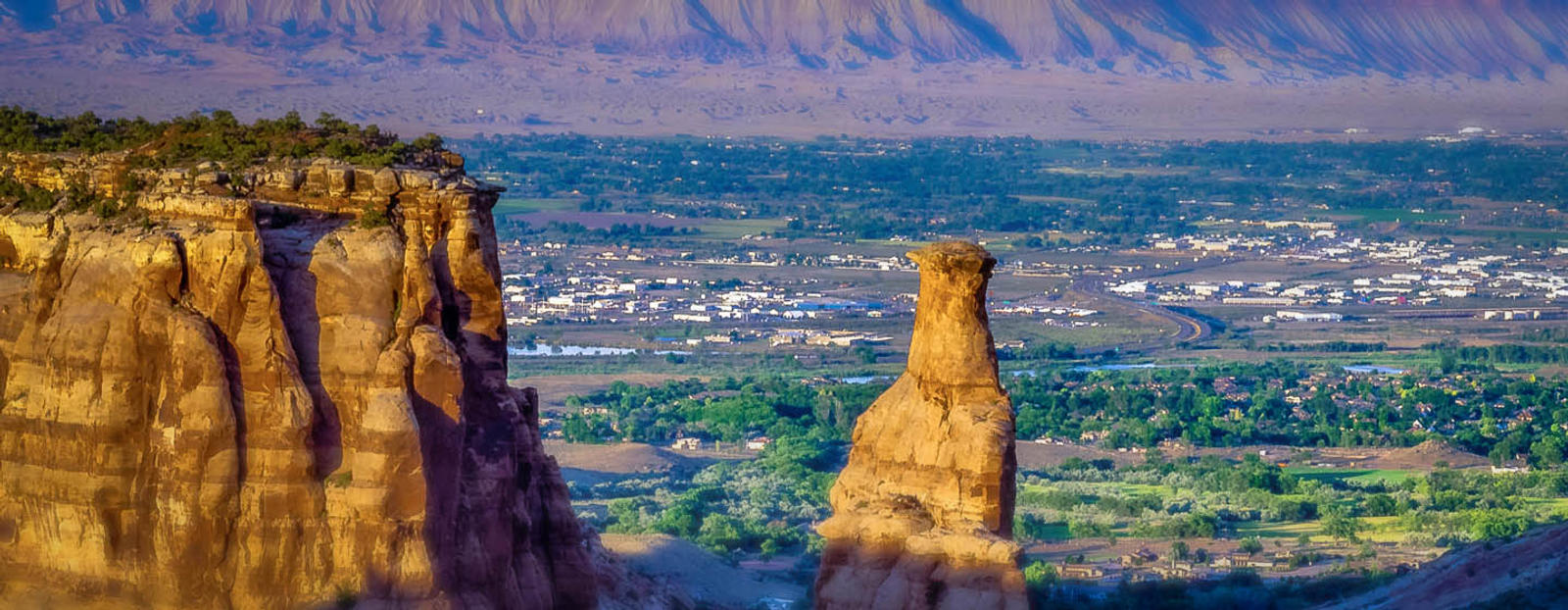 Canyon with Grand Junction in the distance